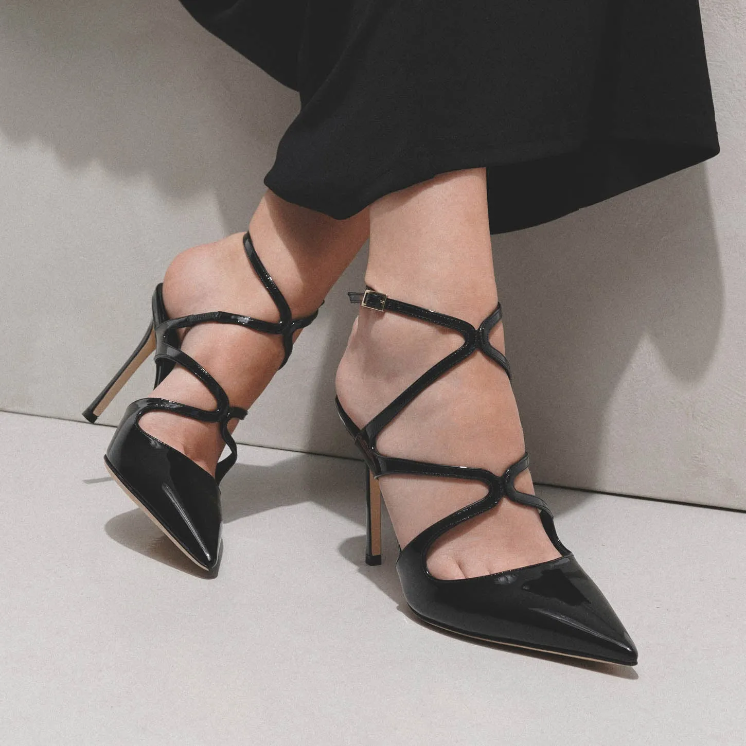 Azia 95 black patent pumps